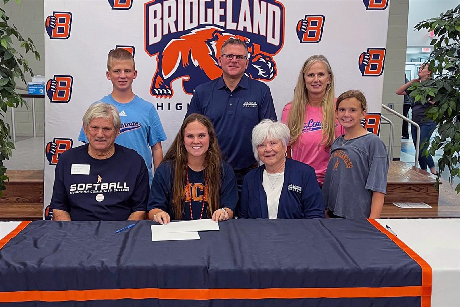 Bridgeland High School senior Makenzi Jenkins, seated second from left, signed a letter of intent to play softball.